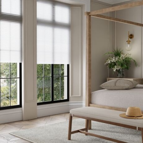 honeycomb light filtering shade in a modern cottage style bedroom