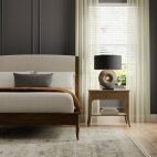 faux wood blinds in bedroom layered under curtains