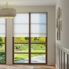 honeycomb light filtering shade in hallway