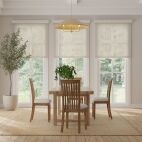 natural woven appearance roller shades in modern cottage style dining room