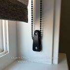 Black chain tension device and clutch roller shade