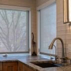 Grey solar screen over kitchen sink closed