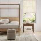 bamboo breeze honey woven roller shades in bedroom
